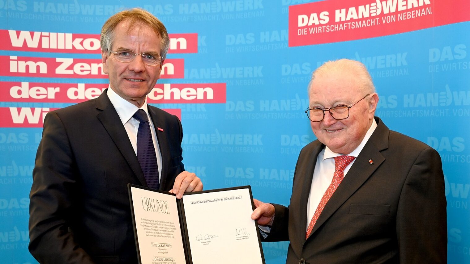 (v. l.): Kammerpräsident Andreas Ehlert und Dr. Karl Bühler