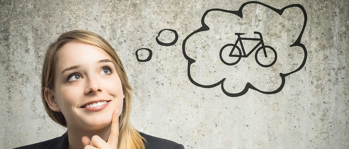 Frau denkt an Fahrrad -Fotolia_79416660_M 7 zu 3